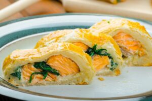 Salmon baked in puff pastry